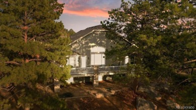 Exquisitely located on the edge of 11 acres of HOA owned forest on The Ridge At Castle Pines North in Colorado - for sale on GolfHomes.com, golf home, golf lot