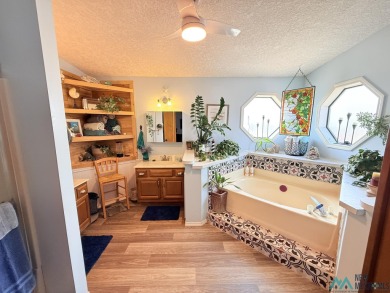 This charming 3 bed 2 bath 1822 sf ft home located in Elephant on Sierra Del Rio Golf Club in New Mexico - for sale on GolfHomes.com, golf home, golf lot