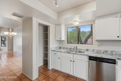 Set on a rare double lot in the gated Villages of La Canada on El Conquistador Country Club - Canada in Arizona - for sale on GolfHomes.com, golf home, golf lot