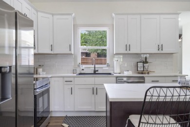 This stunning 4-bedroom, 2-bath home has been completely rebuilt on Horton Smith Golf Course in Missouri - for sale on GolfHomes.com, golf home, golf lot