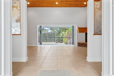 Experience timeless luxury and laid-back elegance on this gated on The Florida Club in Florida - for sale on GolfHomes.com, golf home, golf lot