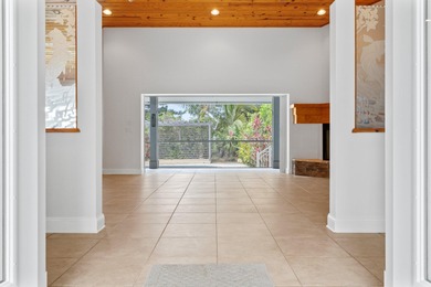 Experience timeless luxury and laid-back elegance on this gated on The Florida Club in Florida - for sale on GolfHomes.com, golf home, golf lot