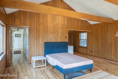 Discover a sanctuary of quiet elegance at 614 Lake Shore Drive on Walnut Creek Country Club in North Carolina - for sale on GolfHomes.com, golf home, golf lot