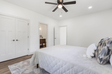 This stunning 4-bedroom, 2-bath home has been completely rebuilt on Horton Smith Golf Course in Missouri - for sale on GolfHomes.com, golf home, golf lot