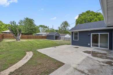 This stunning 4-bedroom, 2-bath home has been completely rebuilt on Horton Smith Golf Course in Missouri - for sale on GolfHomes.com, golf home, golf lot