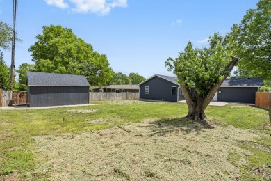 This stunning 4-bedroom, 2-bath home has been completely rebuilt on Horton Smith Golf Course in Missouri - for sale on GolfHomes.com, golf home, golf lot