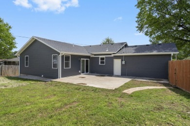 This stunning 4-bedroom, 2-bath home has been completely rebuilt on Horton Smith Golf Course in Missouri - for sale on GolfHomes.com, golf home, golf lot