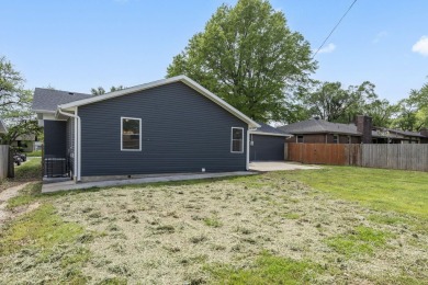 This stunning 4-bedroom, 2-bath home has been completely rebuilt on Horton Smith Golf Course in Missouri - for sale on GolfHomes.com, golf home, golf lot