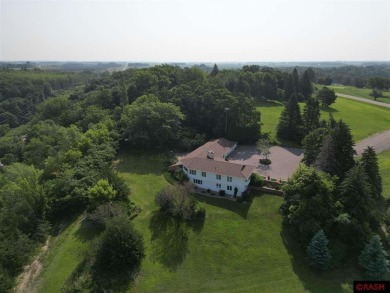 Welcome to this stunning timeless midcentury style home on Shoreland Golf and Tennis Club in Minnesota - for sale on GolfHomes.com, golf home, golf lot