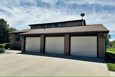 Experience luxury living in this stunning 4 bedroom, 4 bath home on Fort Dodge Country Club in Iowa - for sale on GolfHomes.com, golf home, golf lot