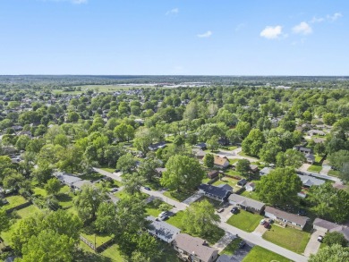 This stunning 4-bedroom, 2-bath home has been completely rebuilt on Horton Smith Golf Course in Missouri - for sale on GolfHomes.com, golf home, golf lot