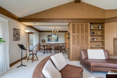 Welcome to this stunning timeless midcentury style home on Shoreland Golf and Tennis Club in Minnesota - for sale on GolfHomes.com, golf home, golf lot