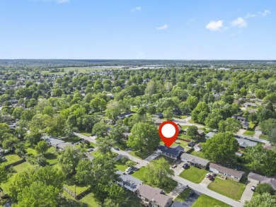 This stunning 4-bedroom, 2-bath home has been completely rebuilt on Horton Smith Golf Course in Missouri - for sale on GolfHomes.com, golf home, golf lot