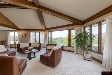 Welcome to this stunning timeless midcentury style home on Shoreland Golf and Tennis Club in Minnesota - for sale on GolfHomes.com, golf home, golf lot