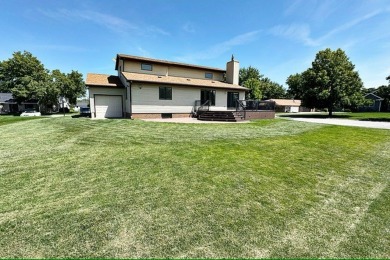 Experience luxury living in this stunning 4 bedroom, 4 bath home on Fort Dodge Country Club in Iowa - for sale on GolfHomes.com, golf home, golf lot