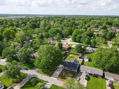 This stunning 4-bedroom, 2-bath home has been completely rebuilt on Horton Smith Golf Course in Missouri - for sale on GolfHomes.com, golf home, golf lot