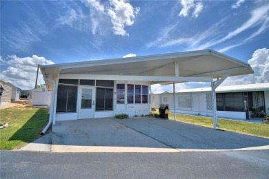 FLORIDA LIFESTYLE AT ITS BEST... GATED 55+COMMUNITY...OWN YOUR on Southern Dunes Golf and Country Club in Florida - for sale on GolfHomes.com, golf home, golf lot