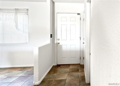 Welcome to a beautifully designed 4-bedroom, 3.5-bath home on Los Lagos Golf Club in Arizona - for sale on GolfHomes.com, golf home, golf lot