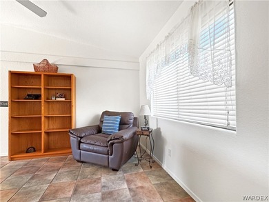 Welcome to a beautifully designed 4-bedroom, 3.5-bath home on Los Lagos Golf Club in Arizona - for sale on GolfHomes.com, golf home, golf lot