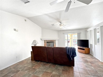 Welcome to a beautifully designed 4-bedroom, 3.5-bath home on Los Lagos Golf Club in Arizona - for sale on GolfHomes.com, golf home, golf lot