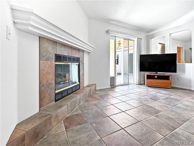 Welcome to a beautifully designed 4-bedroom, 3.5-bath home on Los Lagos Golf Club in Arizona - for sale on GolfHomes.com, golf home, golf lot