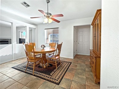 Welcome to a beautifully designed 4-bedroom, 3.5-bath home on Los Lagos Golf Club in Arizona - for sale on GolfHomes.com, golf home, golf lot