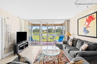 Discover your slice of paradise in this beautiful 2BR/2BA Palm on Palm-Aire Country Club and Resort - Palms in Florida - for sale on GolfHomes.com, golf home, golf lot