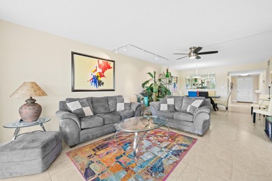 Discover your slice of paradise in this beautiful 2BR/2BA Palm on Palm-Aire Country Club and Resort - Palms in Florida - for sale on GolfHomes.com, golf home, golf lot