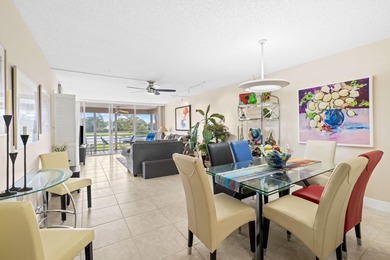Discover your slice of paradise in this beautiful 2BR/2BA Palm on Palm-Aire Country Club and Resort - Palms in Florida - for sale on GolfHomes.com, golf home, golf lot