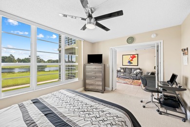 Discover your slice of paradise in this beautiful 2BR/2BA Palm on Palm-Aire Country Club and Resort - Palms in Florida - for sale on GolfHomes.com, golf home, golf lot