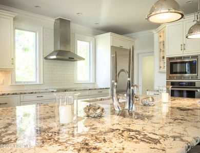 Absolutely magical home overlooking Landfall's largest lake, the on Country Club of Landfall in North Carolina - for sale on GolfHomes.com, golf home, golf lot