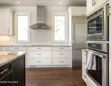 Absolutely magical home overlooking Landfall's largest lake, the on Country Club of Landfall in North Carolina - for sale on GolfHomes.com, golf home, golf lot