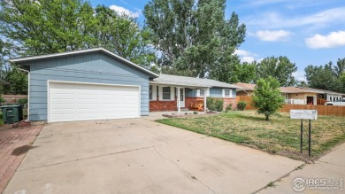 MAIN LEVEL LIVING WITH NEARBY AMENATIES, such as the local golf on Bunker Hill Country Club in Colorado - for sale on GolfHomes.com, golf home, golf lot