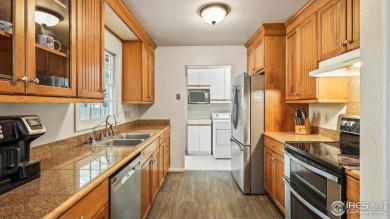 MAIN LEVEL LIVING WITH NEARBY AMENATIES, such as the local golf on Bunker Hill Country Club in Colorado - for sale on GolfHomes.com, golf home, golf lot