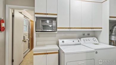 MAIN LEVEL LIVING WITH NEARBY AMENATIES, such as the local golf on Bunker Hill Country Club in Colorado - for sale on GolfHomes.com, golf home, golf lot
