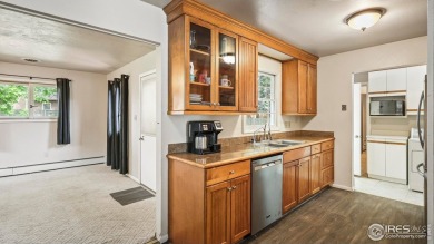 MAIN LEVEL LIVING WITH NEARBY AMENATIES, such as the local golf on Bunker Hill Country Club in Colorado - for sale on GolfHomes.com, golf home, golf lot