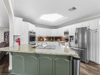 A gorgeous, cozy 2,236 sqft 3-bedroom, 2.5 Bath home sits on 1 on Wolf Ridge Golf Course in Oklahoma - for sale on GolfHomes.com, golf home, golf lot