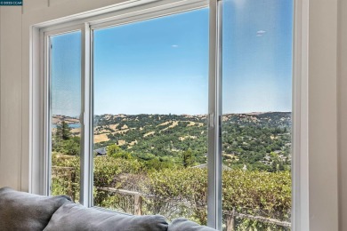 Perched on a private ridge above Orinda, this light-bathed on Orinda Country Club in California - for sale on GolfHomes.com, golf home, golf lot