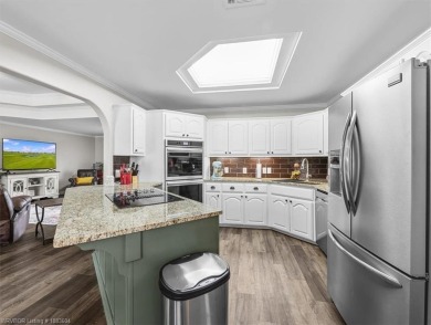 A gorgeous, cozy 2,236 sqft 3-bedroom, 2.5 Bath home sits on 1 on Wolf Ridge Golf Course in Oklahoma - for sale on GolfHomes.com, golf home, golf lot