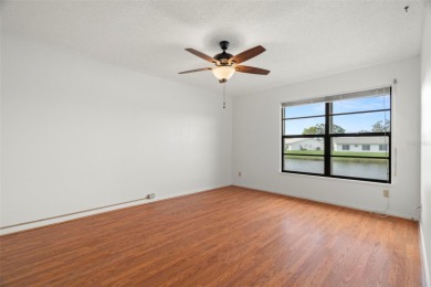 RARE, POND VILLA UNIT AVAILABLE! BEAUTIFUL WATER VIEWS! MOVE-IN on Mainlands Golf Club in Florida - for sale on GolfHomes.com, golf home, golf lot