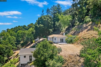 Perched on a private ridge above Orinda, this light-bathed on Orinda Country Club in California - for sale on GolfHomes.com, golf home, golf lot