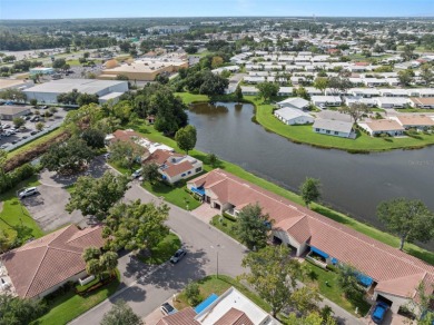 RARE, POND VILLA UNIT AVAILABLE! BEAUTIFUL WATER VIEWS! MOVE-IN on Mainlands Golf Club in Florida - for sale on GolfHomes.com, golf home, golf lot