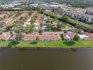RARE, POND VILLA UNIT AVAILABLE! BEAUTIFUL WATER VIEWS! MOVE-IN on Mainlands Golf Club in Florida - for sale on GolfHomes.com, golf home, golf lot