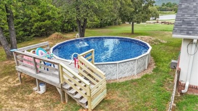 A gorgeous, cozy 2,236 sqft 3-bedroom, 2.5 Bath home sits on 1 on Wolf Ridge Golf Course in Oklahoma - for sale on GolfHomes.com, golf home, golf lot