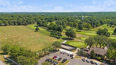 Huge open-concept main level: Check! Spacious bedrooms with a on Minor Park Golf Course in Missouri - for sale on GolfHomes.com, golf home, golf lot