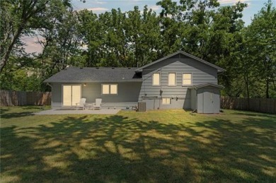 Huge open-concept main level: Check! Spacious bedrooms with a on Minor Park Golf Course in Missouri - for sale on GolfHomes.com, golf home, golf lot