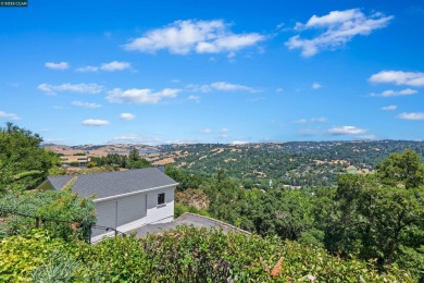 Perched on a private ridge above Orinda, this light-bathed on Orinda Country Club in California - for sale on GolfHomes.com, golf home, golf lot
