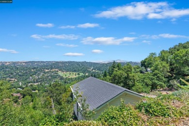 Perched on a private ridge above Orinda, this light-bathed on Orinda Country Club in California - for sale on GolfHomes.com, golf home, golf lot