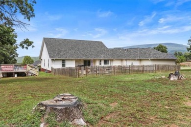 A gorgeous, cozy 2,236 sqft 3-bedroom, 2.5 Bath home sits on 1 on Wolf Ridge Golf Course in Oklahoma - for sale on GolfHomes.com, golf home, golf lot