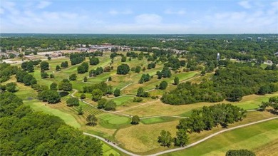 Huge open-concept main level: Check! Spacious bedrooms with a on Minor Park Golf Course in Missouri - for sale on GolfHomes.com, golf home, golf lot